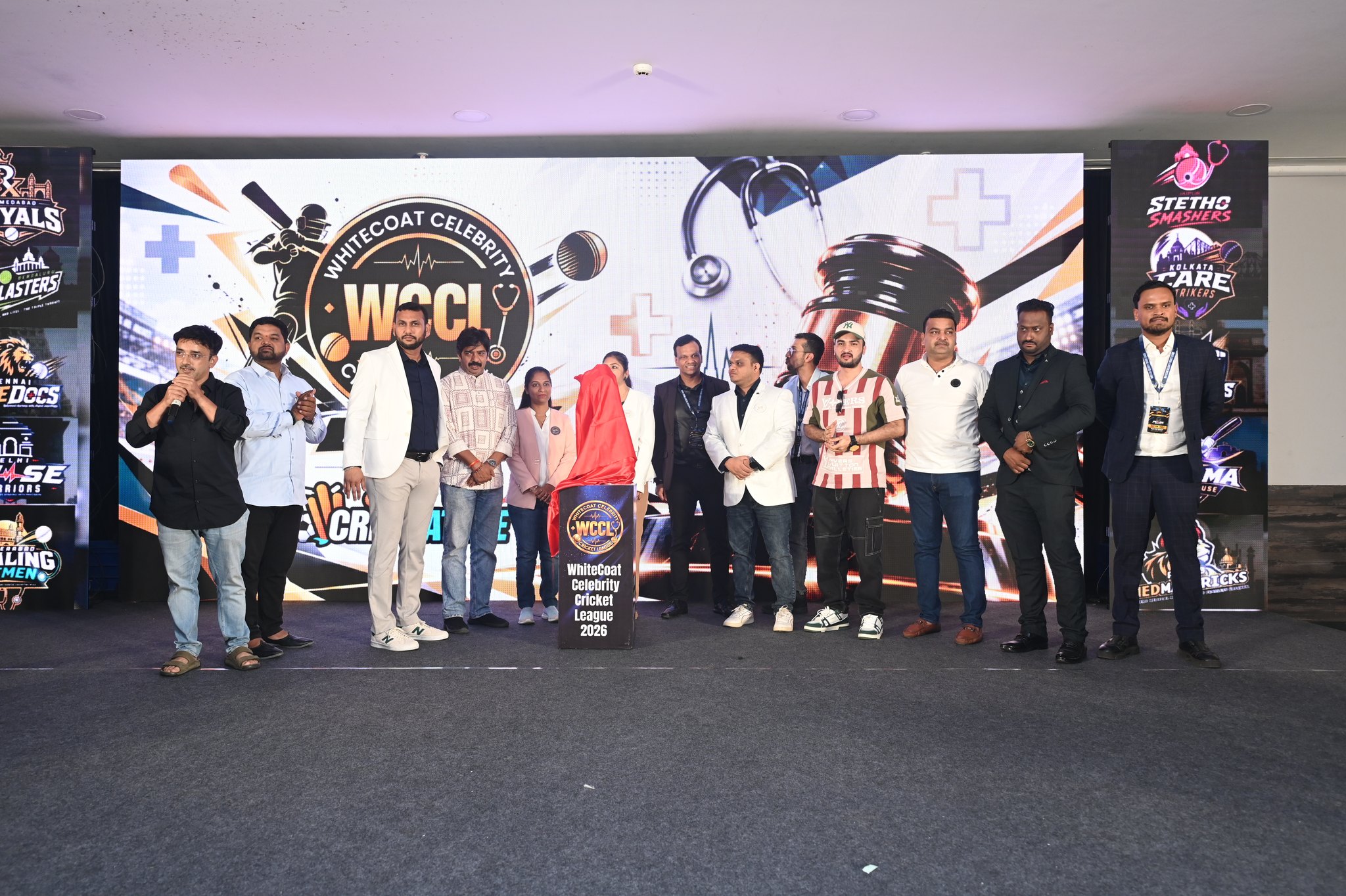 Organisers and guests on the WCCL Grand Auction stage